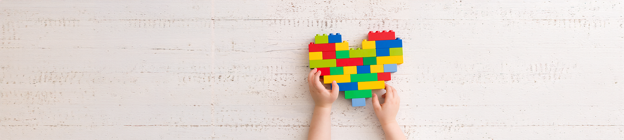 child with lego shaped heart